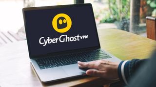 CyberGhost VPN logo on a laptop